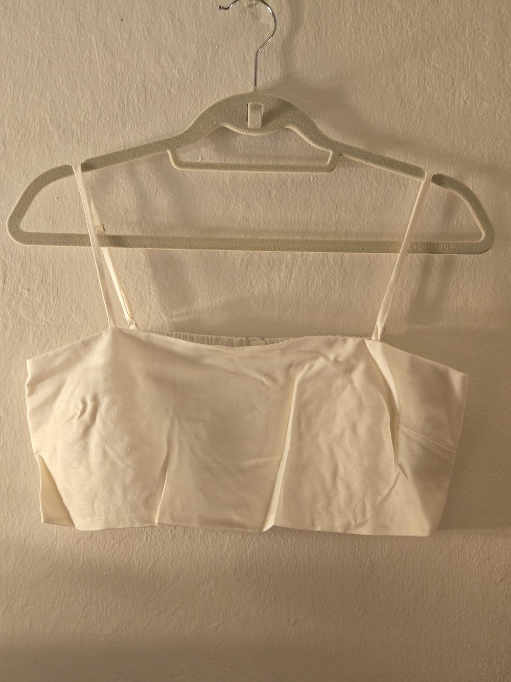 Cream cropped top with thin spaghetti straps